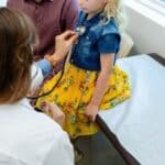 Photo: A doctor examines a child in the office in a stock of photos that is not dated.